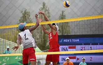 Rachmawan (wit) in actie tijdens de Aziatische Spelen in Incheon (2014)