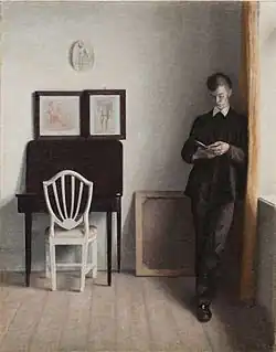 Vilhelm Hammershøi, Interieur met jonge, lezende man, 1898