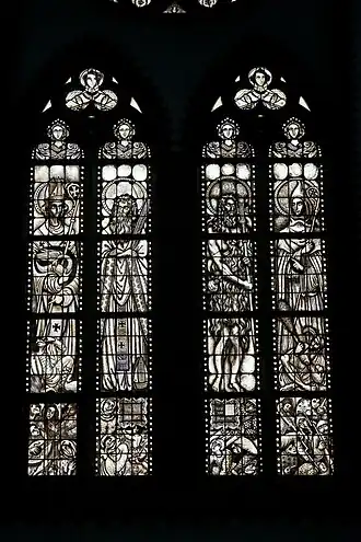 Gebrandschilderde ramen in het noordelijke transept van de Sint-Nicolaaskerk (Sint Nicolaasga), voorstellende Liudger, bisschop van Munster, Feico van Hallum, Dodo van Haske en Eelco, abt van Lidlum