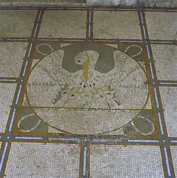 Terrazzovloer hal: pelikaan met jongen