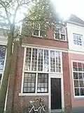 Italiaanse Zeedijk 58, voormalig vissersgildehuis[4]