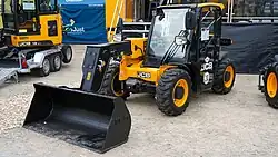 Verreiker met grondbak als aanbouwdeel