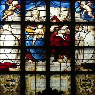 Lethmaet (knielend links) afgebeeld op Glas 11 van de Sint-Janskerk te Gouda.
