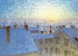 Zonsopgang boven de daken