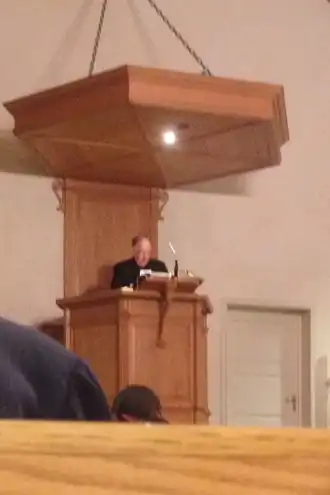 Ouderling Philibert op de kansel te Geldermalsen