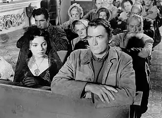 Joan Collins en Gregory Peck in The Bravados