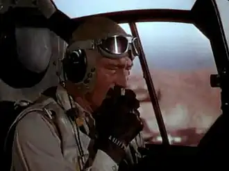 John Wayne in de trailer van Flying Leathernecks