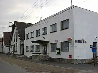 Dorphuis en postkantoor van Kópháza