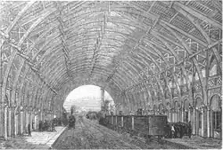 Onder de kap in 1899.