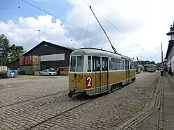 Gestroomlijnde vierassige motorwagen 701 als lijn 2; 31 augustus 2013.