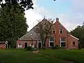 Kop-hals-rompboerderij in ambachtelijk-traditionele stijl