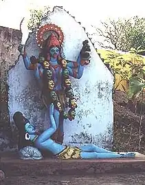 Kali bovenop Shiva