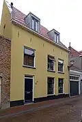 Pand met restanten van de middeleeuwse stadsmuur (Hotel Dijk)