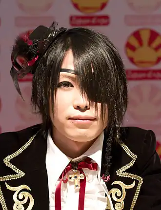 De basgitarist, Kanon, op de Japan Expo, in Parijs in 2010