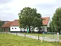 Historische hoeve, bestaande uit losstaande bestanddelen