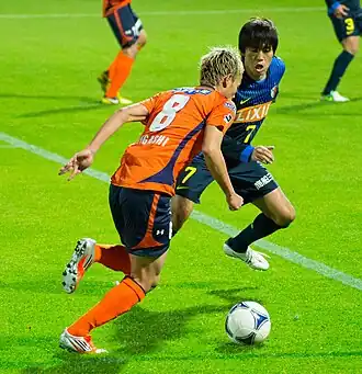 Keigo Higashi en Toru Araiba (rechts)