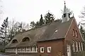Evang.-luthers kerkje (in 1961 ingericht in de voormalige dorpsschool)