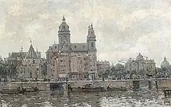 Gezicht op Sint Nicolaaskerk en Schreierstoren te Amsterdam