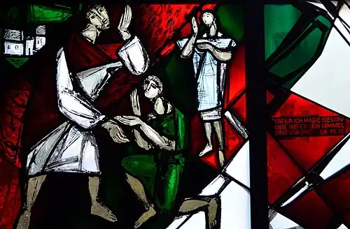 Gebrandschilderd raam van de gelijkenis van de verloren zoon