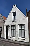 Woonhuis + pakhuisje in traditionele stijl