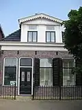Woonhuis met invloeden van Neoclassicisme/chaletstijl