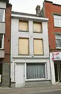 Woonhuis met winkelpui (gesloopt)