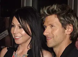 Gene Thomas (rechts) met zijn echtgenote Kristel Verbeke tijdens de uitreiking van de anne awards 2012