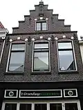 Winkelpand/woonhuis met neorenaissance stijlelementen