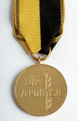 De Medaille (keerzijde)