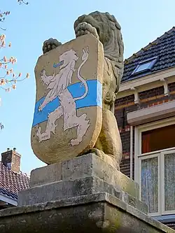 Schildhoudende leeuw