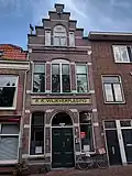 Gezondheidscentrum in Hollandse Renaissance (elementen) stijl, thans woonhuis