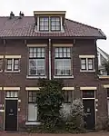 Winkelwoning, onderdeel van Woningcomplex Oranjeboomstraat