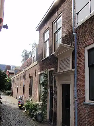 Ingang aan de schoolsteeg