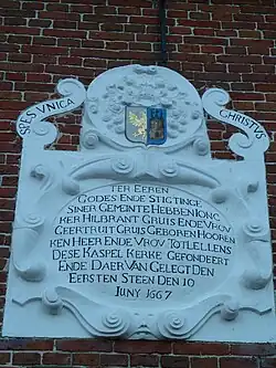 Gevelsteen ter herdenking van de legging van de eerste steen