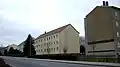 Arbeiderswoonwijk uit de DDR-periode te Tröbitz aan de straat naar Bad Liebenwerda