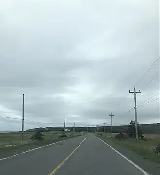 Zicht op twee van de zes huizen van Little Barasway (2023)