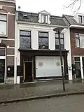 Winkel met bovenwoning
