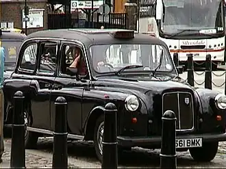 Een Hackney, een klassieke Londense taxi