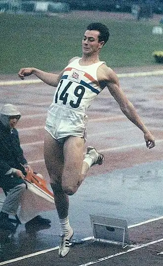 Lynn Davies in actie tijdens de OS van 1964, Tokio