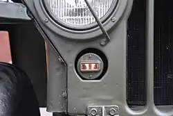 Verduisterde markeerlichten op een Jeep