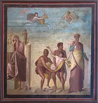 Dit 1e-eeuwse fresco uit Pompeï toont hoe Ifigeneia op het punt staat te worden geofferd. Rechts staat de ziener Kalchas, links bedekt Agamemnon zich met zijn kleren en in de lucht verschijnt Artemis met de hinde die Ifigeneia's plaats zal innemen.
