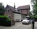Voormalige dienstwoning, behorende bij landhuis aan Dwarsweg 2