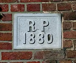 Idem, gevelsteen uit 1880