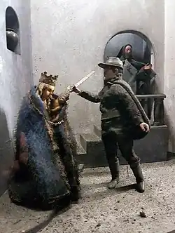 De arm van een Staats soldaat verstijft als hij het beeld bij de zusters van de Nieuwenhof wil stuk slaan