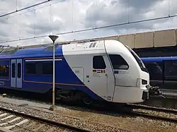 IIImc met Drielandentrein-bestickering.