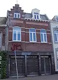 Winkel-woonhuis met voorgevel in neorenaissancestijl