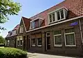 Rij van 5 woningen; deel van een complex van 83 arbeiderswoningen in expressionistische trant (Blauwdorp)