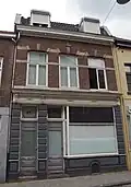 Winkel-woonhuis met voorgevel in eclectische stijl