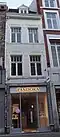 Winkel-woonhuis met voorgevel met kenmerken van art deco