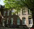 Dubbel woonhuis met voorgevel in eclectische stijl